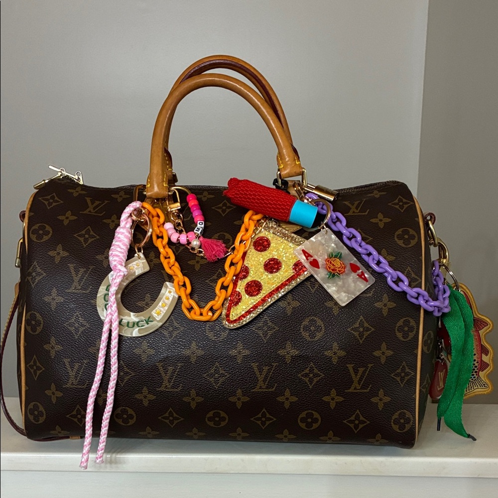 Hand assembled custom curated bag charm/chains